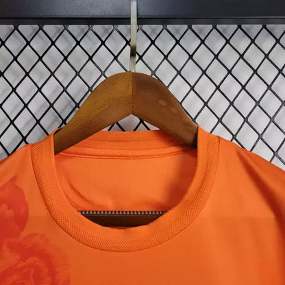 Camisola Real Madrid Away Laranja 24/25 - Versão Adepto