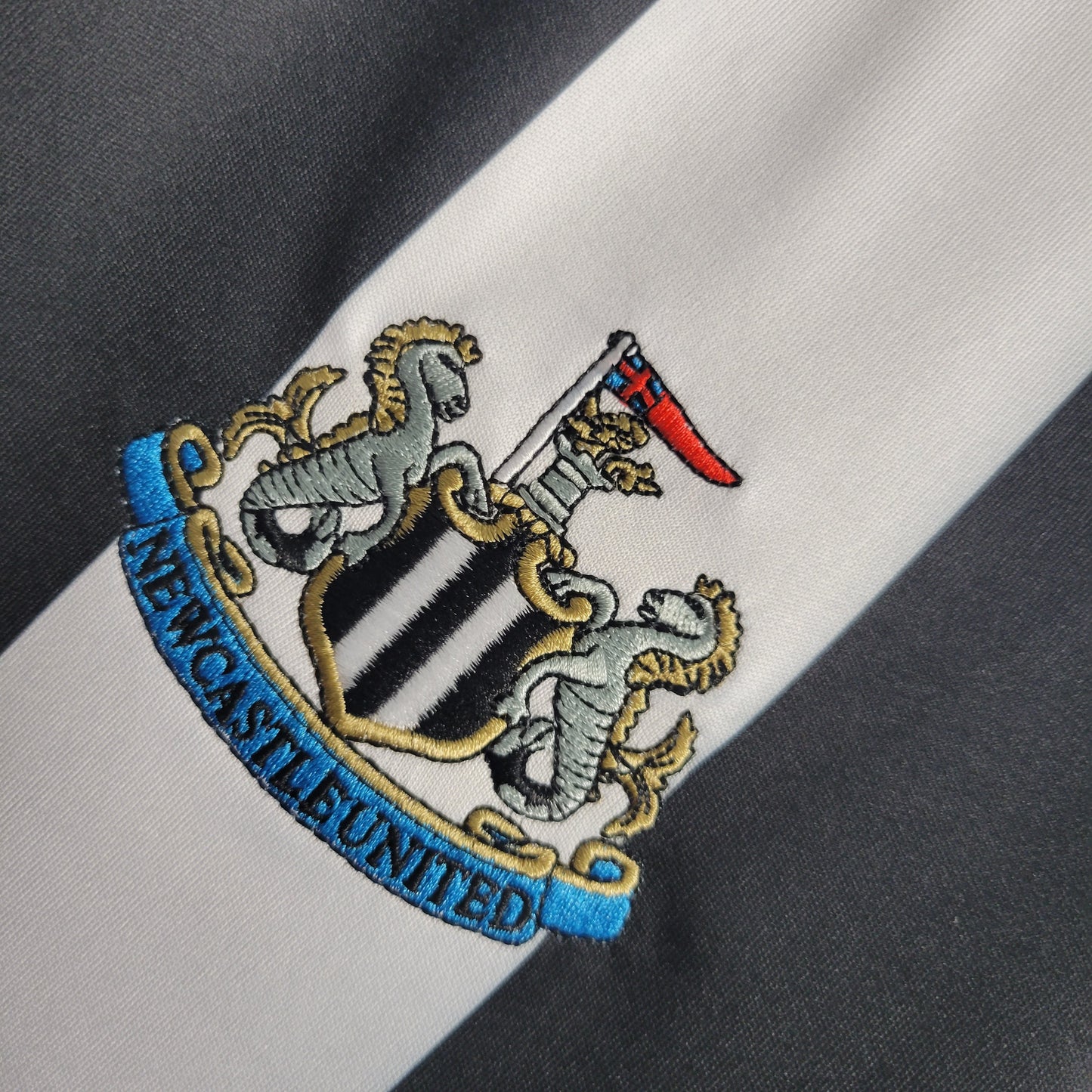 Camisola Newcastle Titular 22/23 - Versão Adepto